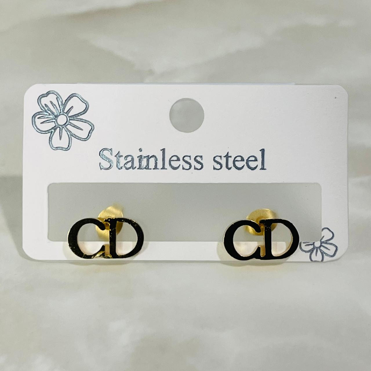 CD Monogram Studs)