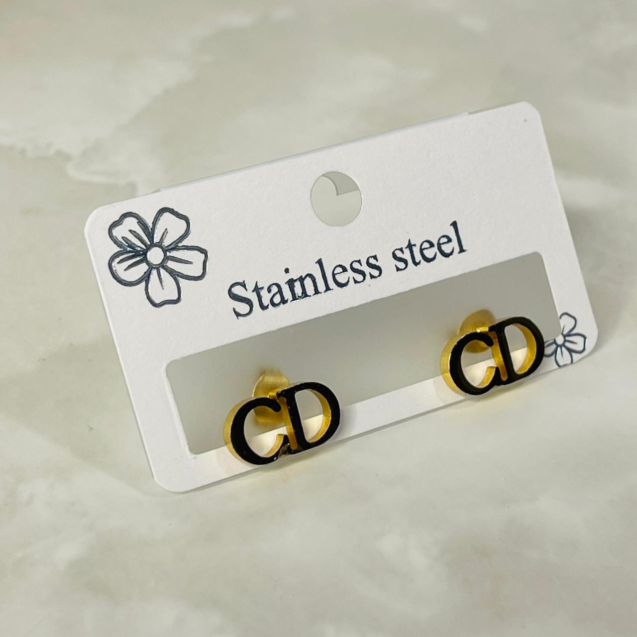CD Monogram Studs)