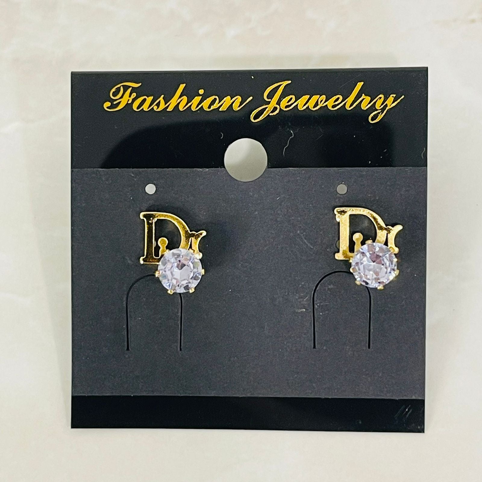 Dior Crystal Logo Studs)