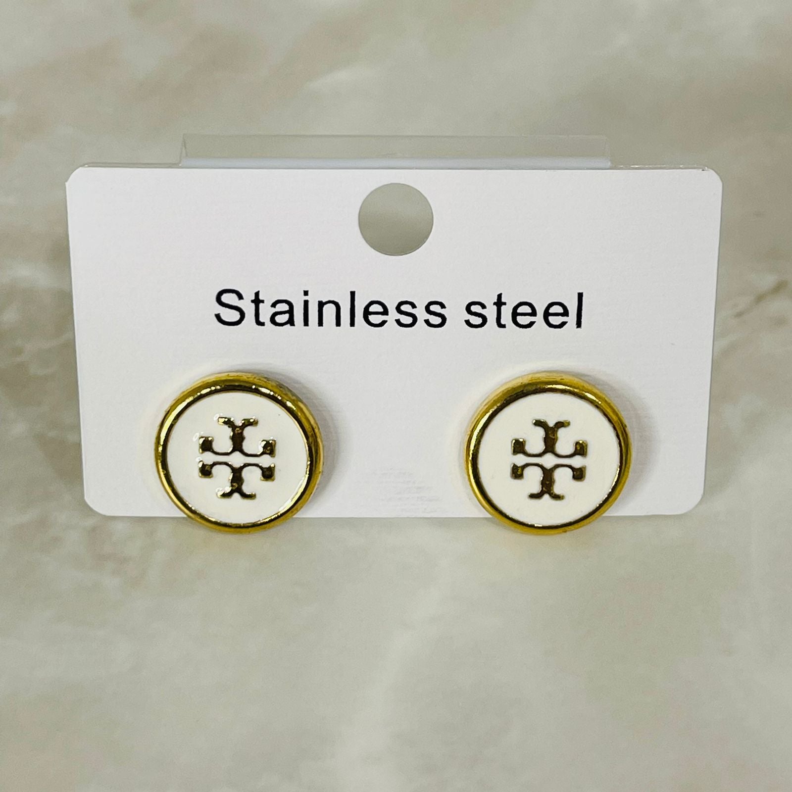 (White Stainless Steel Logo Studs)