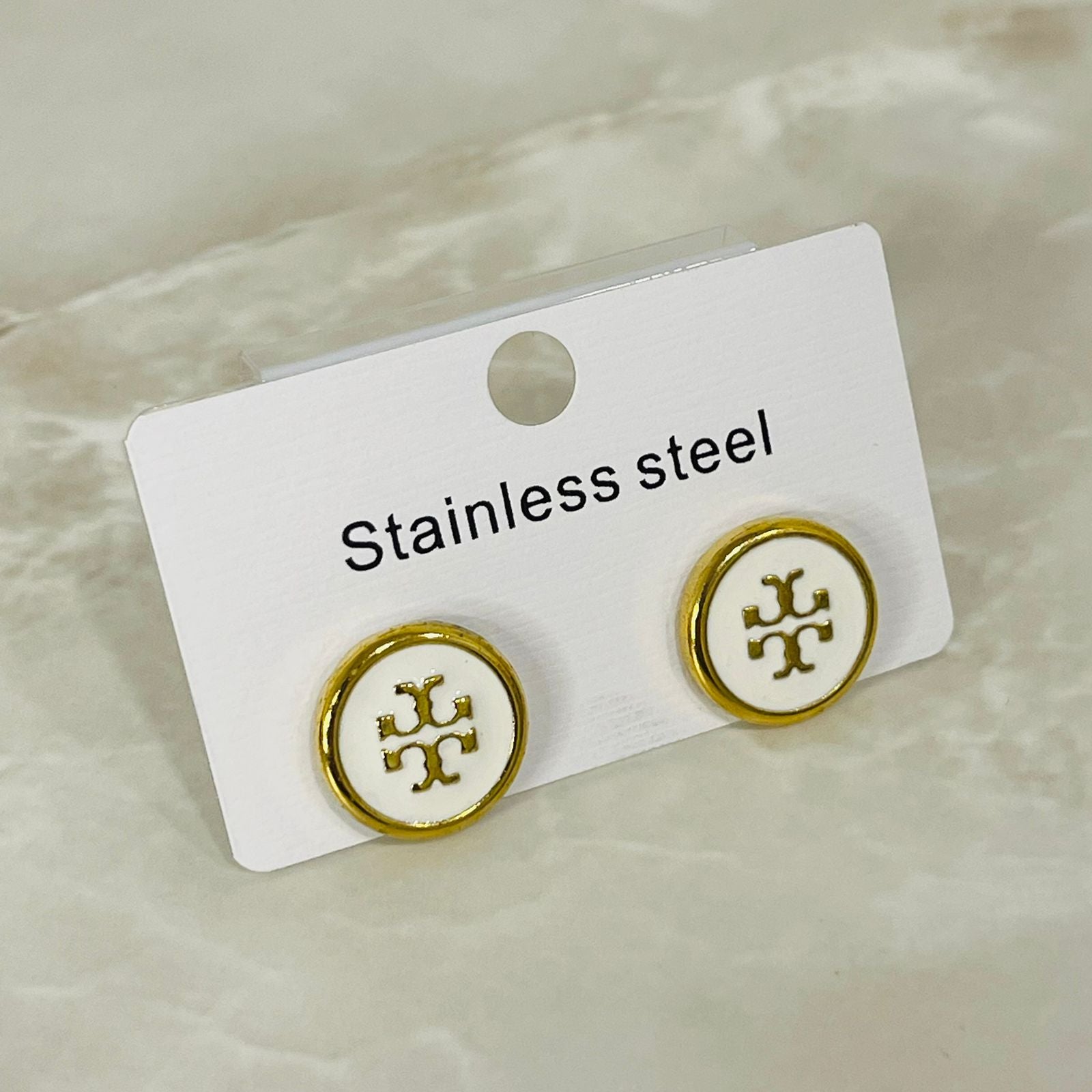 (White Stainless Steel Logo Studs)