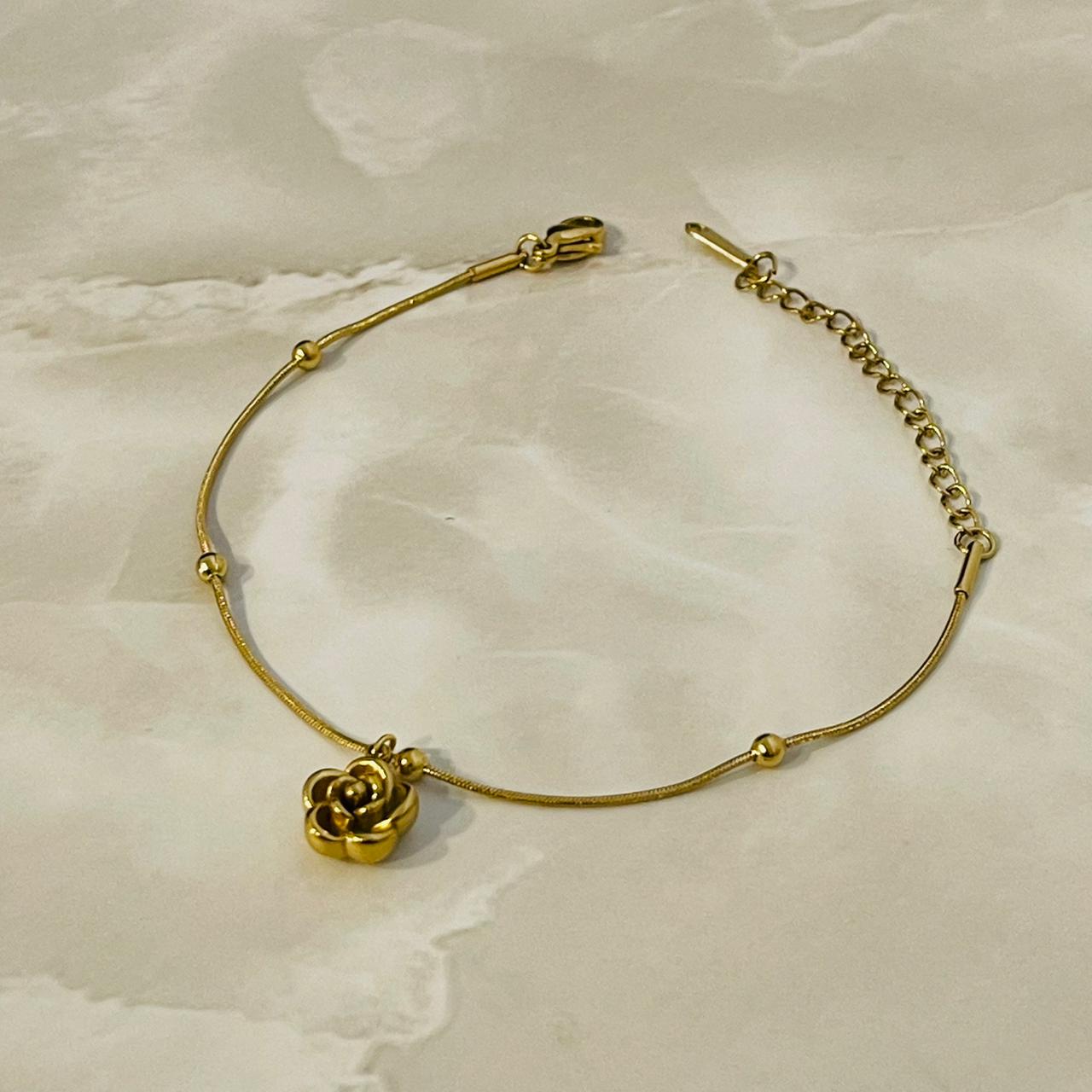 Rose Charm Bracelet Description: